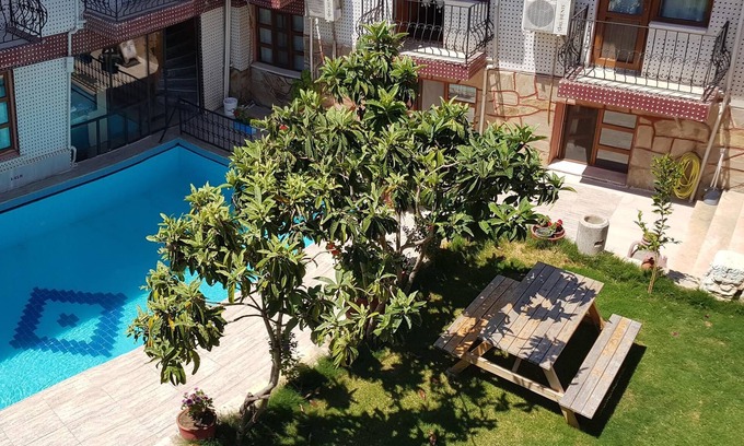 Kusadasi Bed & Breakfast | Sezgin Boutique Hotel TripleRoom A/C,TV,fridge,pool,garden,free wi-fi & car park