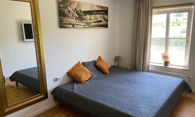 Alt-West Apartment | Shared living room, open kitchen, wellness, 2 double bedrooms with bathrooms.