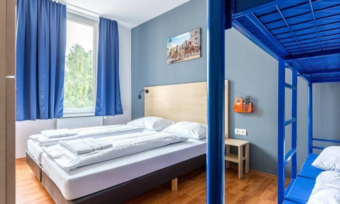 Elisabeth-Vorstadt House | Shared room, shower, WC - a&o Salzburg Hauptbahnhof