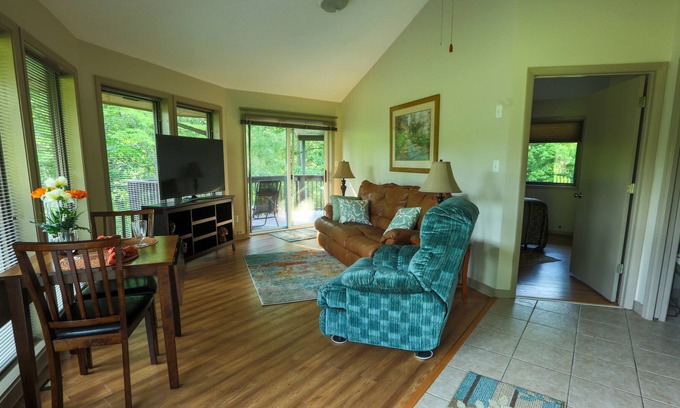 Asheville Cottage | Single little detached round house with one queen bed, kitchenette, and bath
