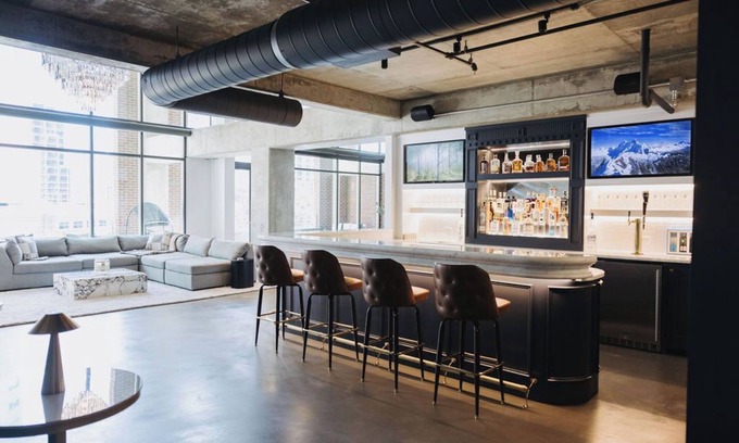 Uptown Condo | Sleek and Spacious Executive Loft with Full Bar, Theater Room, Fitness Room