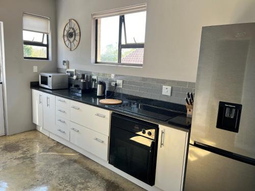 Douglasdale Apartment | Sleek, Smart Cottage in Douglasdale