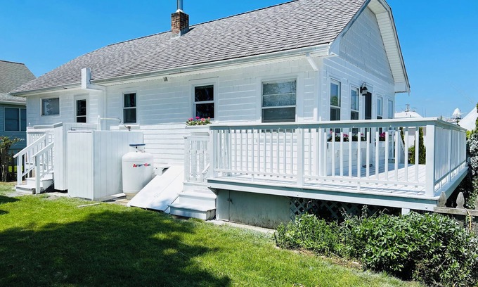 Snug Harbor Cottage | Soak in enchanting water views. Fully-fenced yard for family and pets!