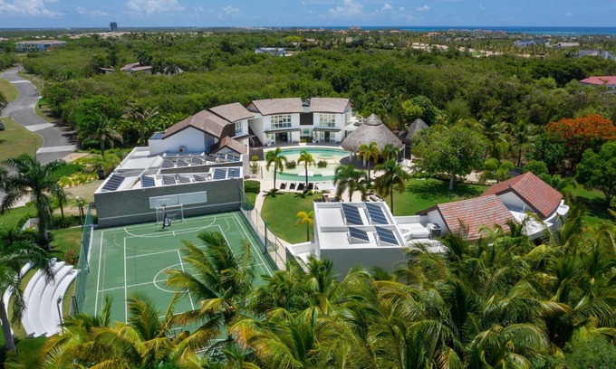 Yarary - Cap Cana House | Soaring Circular Home in Paradise with Multiple-Sports Court, Gym & Home Theater