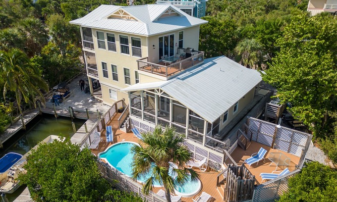 Jose's Hideaway House | Solitude North Captiva, Carts, Dock, Private Pool, Club, Sleeps 12