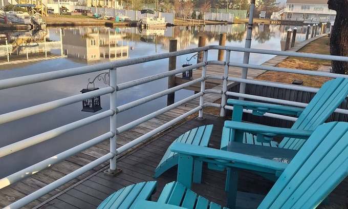 Sandbridge Cottage | Sophisticated waterfront Sandbridge cottage on Back Bay, minutes to the ocean.