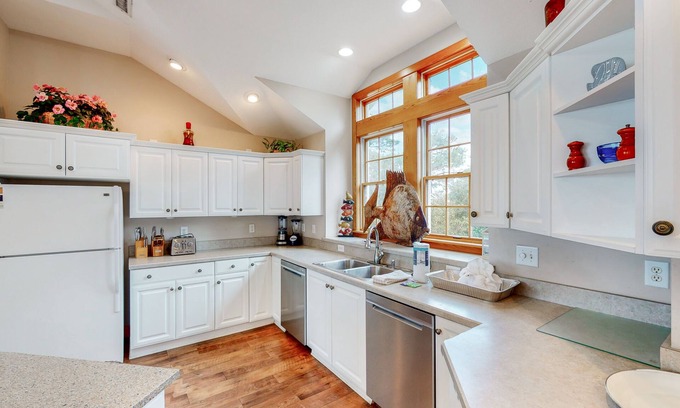 Corolla Light House | sound-front condo with hot tub, indoor pool, & elevator
