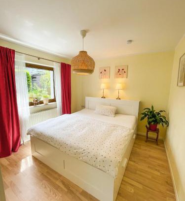 Niederzwehren Apartment | Souterrainwohnung mit großem Garten und Sauna