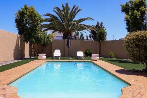 Parklands House | Spacious 4-Bedroom Home With a Pool