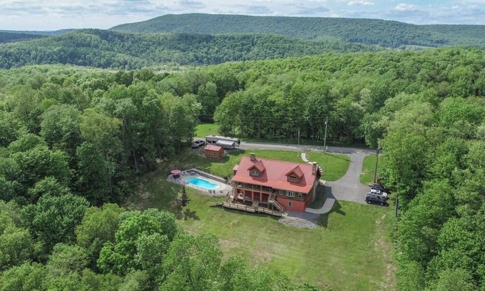 Crellin Cabin | Spacious 6BR Log Cabin Retreat with Pool, Hot Tub & Stunning Mountain Views