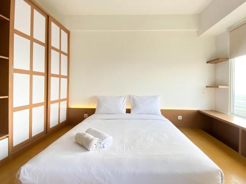 Cikarang Apartment | Spacious Japanese Style Studio Apartment at Vasanta Innopark By Travelio