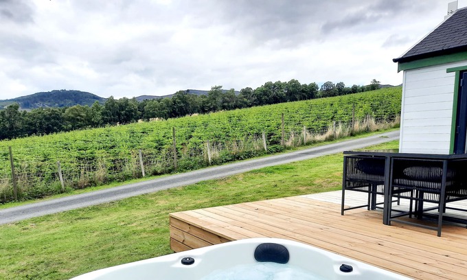 Pitlochry Cabin | Spacious Lodge with woodburner, hot tub and beautiful views from the patio deck.