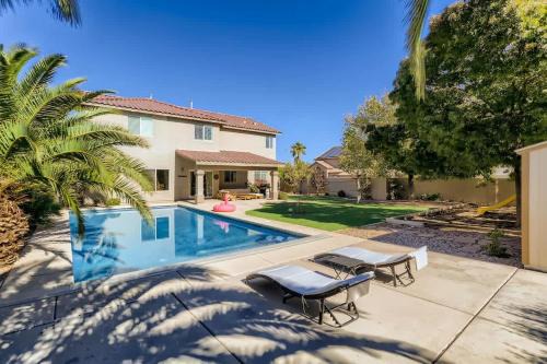 Rhodes Ranch House | Spacious Luxury Desert Retreat with Heated Pool Putt putt and a playground for family