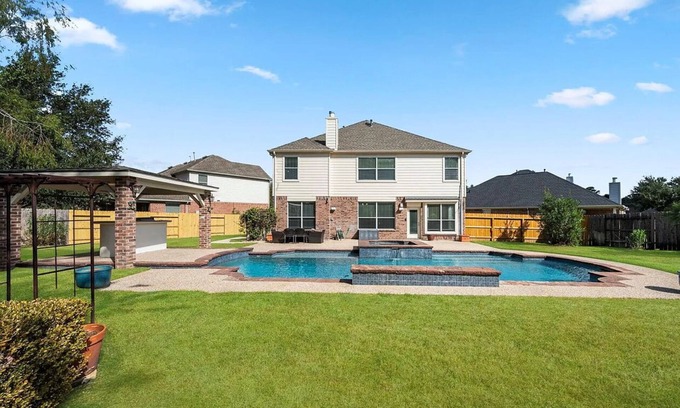Louetta House | Spacious Mid Term Family Home In SPRING with Heated pool & Hot Tub.