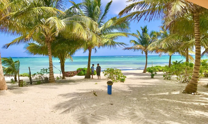 Majahual House | Spacious oceanfront home with palm trees, kayaks and spectacular views!