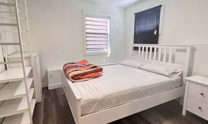 Halifax House | Spacious one bedroom basement apartment with 2 queen size beds &private entrance