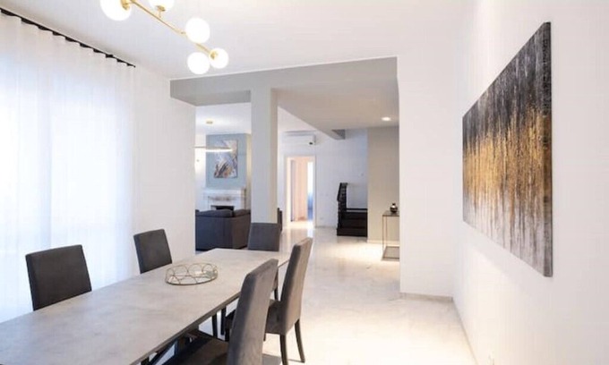 Esquilino Apartment | Spacious penthouse with gym in historic building, near the Colosseum