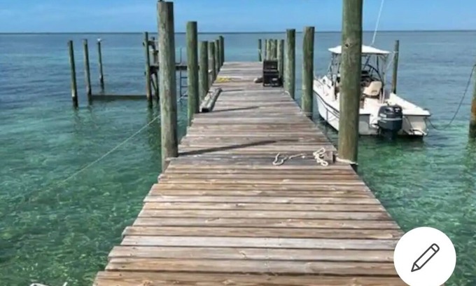 Bahama Palm Shores Cottage | Spectacular sunsets , located on the sea of Abaco. Everything walking distance