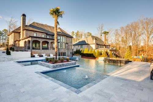 Suwanee House | Sprawling Suwanee Home Theater, Pool, Hot Tub!