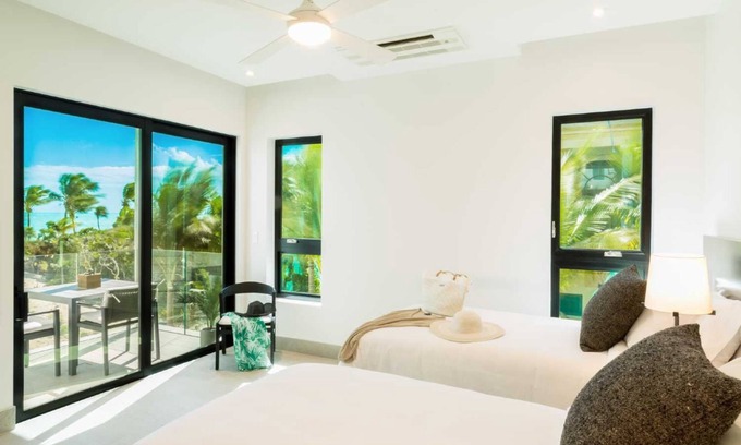 Long Bay Hills Resort | Step out onto your private terrace for amazing garden views!