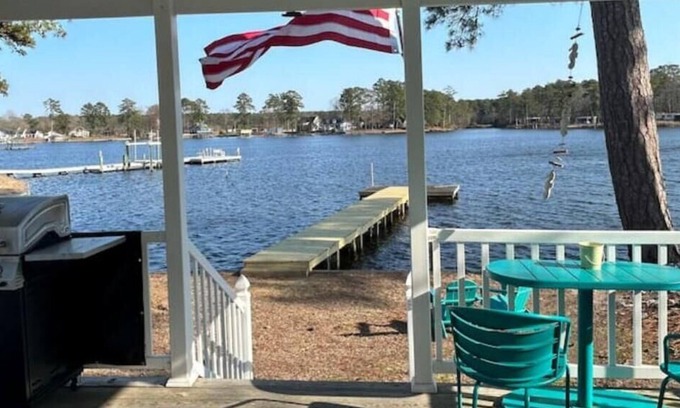 Bath Cabin | Steps from the water with a private dock, a big relaxing porch & great amenities
