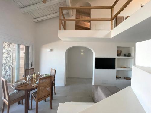 Capo Coda Cavallo Apartment | Strepitoso 4 Camere da letto e Terrazza Vista Mare
