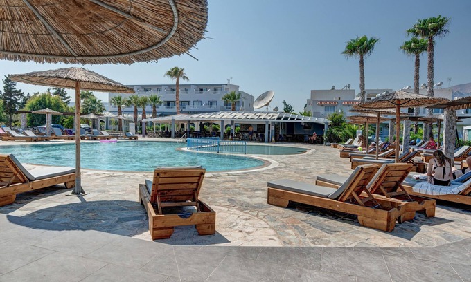Kardamena Apartment | Studio Apartment 'Evripides Triple Room 2' with Shared Pool, Shared Garden and Air Conditioning