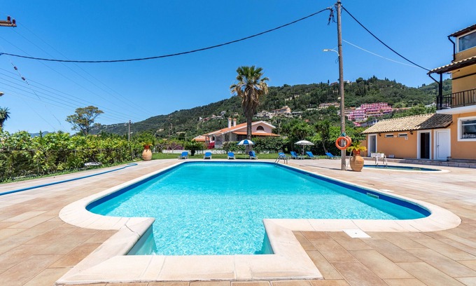 Agios Gordios Apartment | Studio Apartment 'Mires House Side First Floor 10' with Shared Pool, Wi-Fi and Air Conditioning