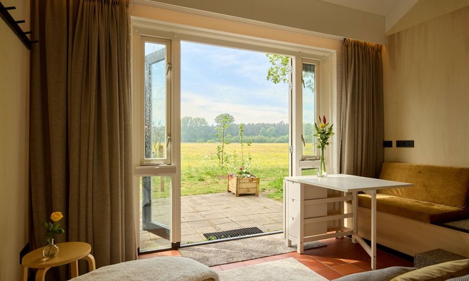Castricum Apartment | Studio apartment with unobstructed view of meadows and forests near the beach.