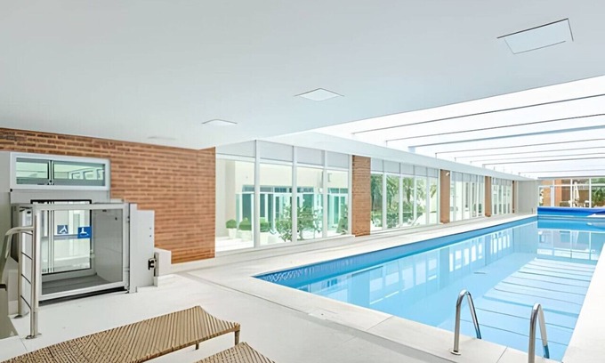 Matriz Apartment | Studio for 4 in Lifespace Curitiba with parking space and air conditioning