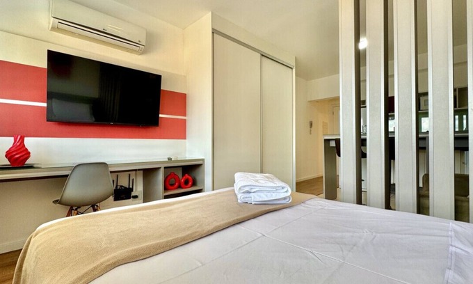 Matriz Apartment | Studio in front of Shopping Curitiba, with garage