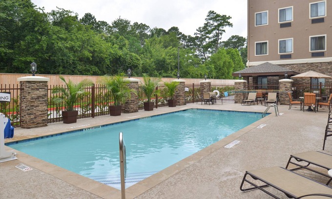 Tomball Apartment | Studio Suite in Tomball | Shared Outdoor Pool + 24h Fitness Center