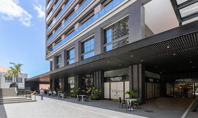 Centro Apartment | Studios Tower - Building near the postcard with swimming pool in the center of Floripa