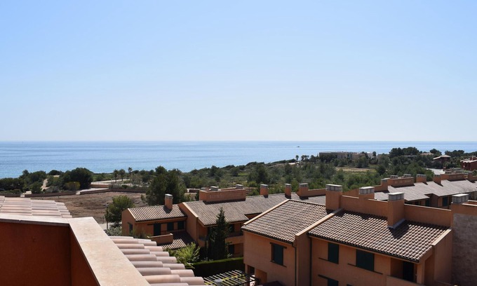 L Almadrava Apartment | Stunning Duplex with Pool, Solarium, and Parking Near Beautiful Coves
