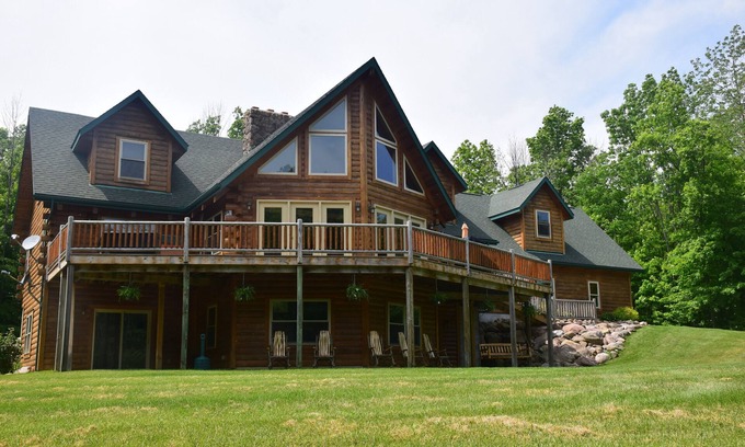 Homerville Cabin | Stunning Log Cabin on 65 Acres with a new swimming pool