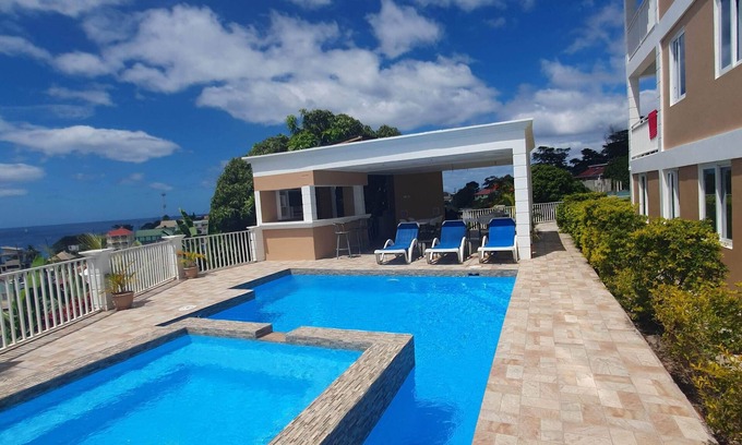 Roseau Apartment | Stunning Ocean & Pool View 2-Bedroom Apartment, 2 mins from the city.