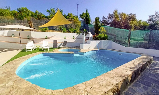 Cabra Villa | Stunning private villa with A/C, hot tub, WIFI, private pool, TV, terrace, pets allowed and park.