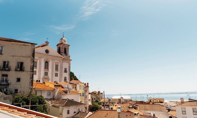 Santo Estevao Apartment | Stunning river view Portuguese Soul Large Terrace in Alfama, sleeps 19
