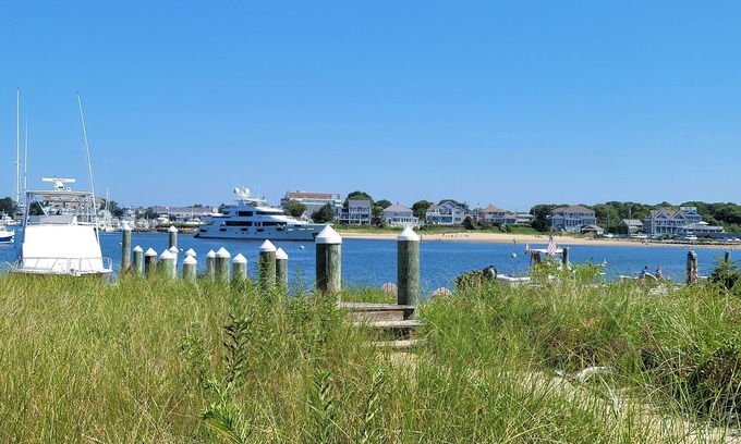 Hyannis House | Stunning waterfront with sandy beach & dock walking distance to top restaurants!