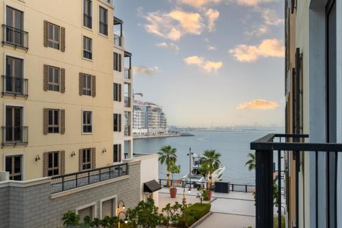 Dubai Apartment | Stylish 1BR Apartment in La Mer Dubai with Balcony and Partial Marina Views