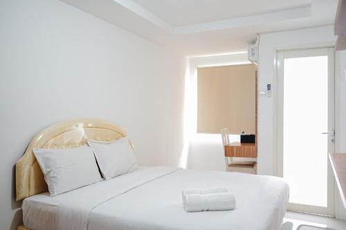 Ciputat Apartment | Stylish and Posh Studio Baileys Apartment By Travelio