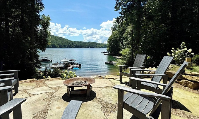 Cullowhee House | Stylish lakefront home with large flat yard, boat dock, hot tub & mountain view!