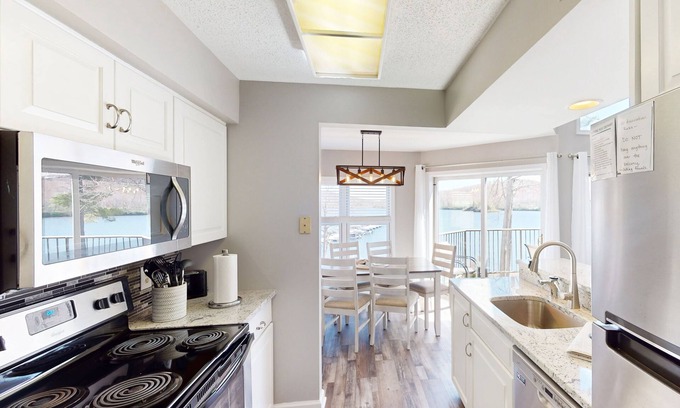 Lake Harmony Condo | Stylish lakefront condo with mountain views, washer/dryer, pool, hot tub