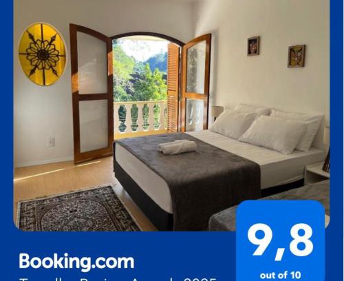 Petropolis Hotel | Suíte Romântica premiada com linda vista de varanda em Petrópolis!