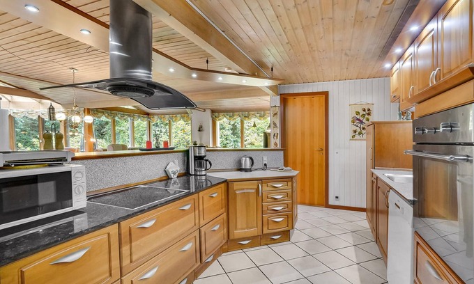 Skovgaarde House | Sufficient space for all you will find in this cozy cottage.