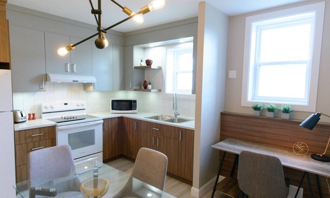 Rouyn-Noranda Apartment | Suite with cloesed bedroom and sofa bed in the city center (Le Court-toit)