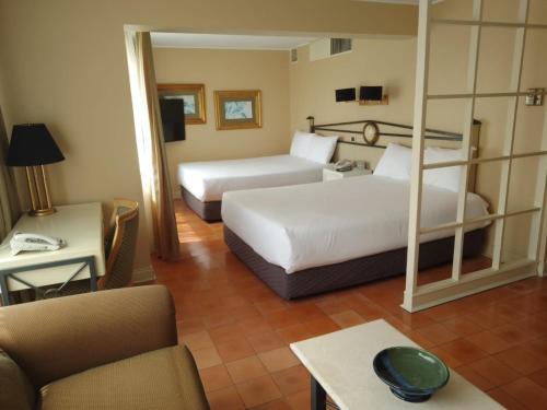 San Isidro Hotel | Suites del Bosque Hotel