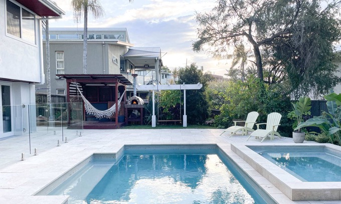 Moffat Beach House | Summer Oasis Retreat: Poolside Pizza Oven & Spa