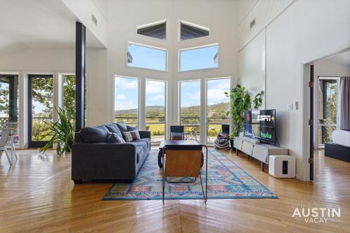 Lower Basin Lake Travis House | Sunset Waterfront 4BR 2BA w Pool and River Near Lake Travis by Austin Vacay