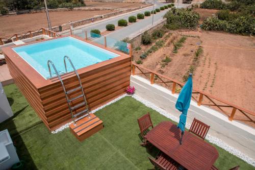 Kirkop House | Tal-Karmnu Entire house with private heated pool and jacuzzi